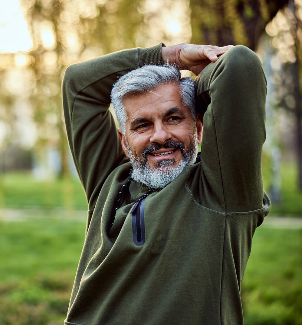 a-smiling-senior-man-with-his-arms-over-his-head-2025-09-09-19-46-16-utc (1)